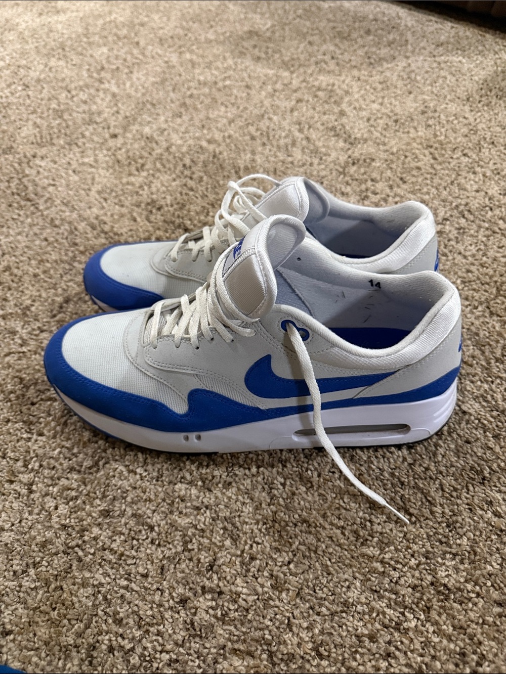White and Blue Nike golf shoes
